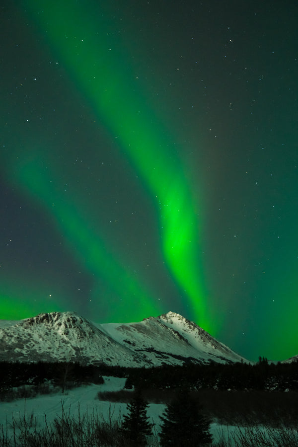 Northern lights over the mountains near Anchorage, Alaska