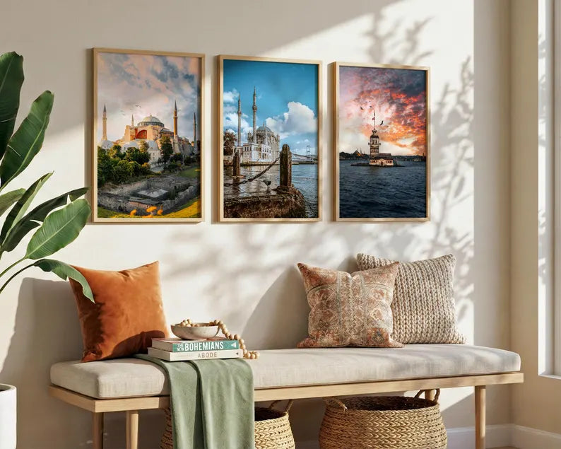 Set of three framed Istanbul prints hanging above a bench